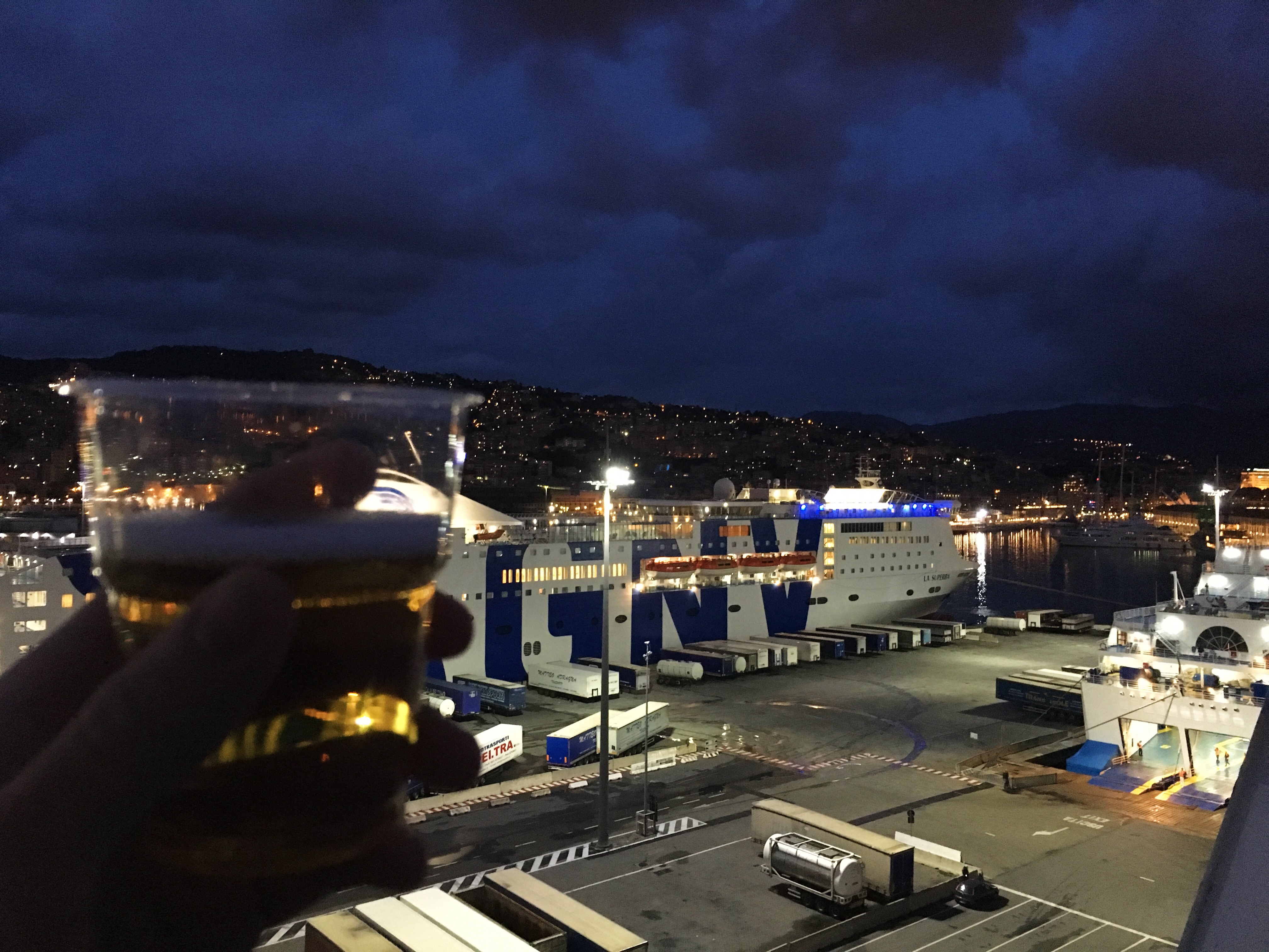 Boarding an overnight ferry from Genova to Sardinia, I say my farewell to a beautiful city and explore the Rhapsody, a ship of Grandi Navi Veloci company.